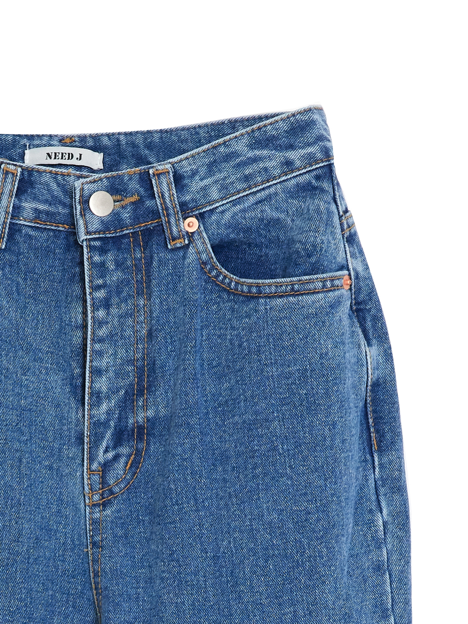 Capture a close-up shot of the bootcut jeans, emphasizing the intricate front details of the garment.