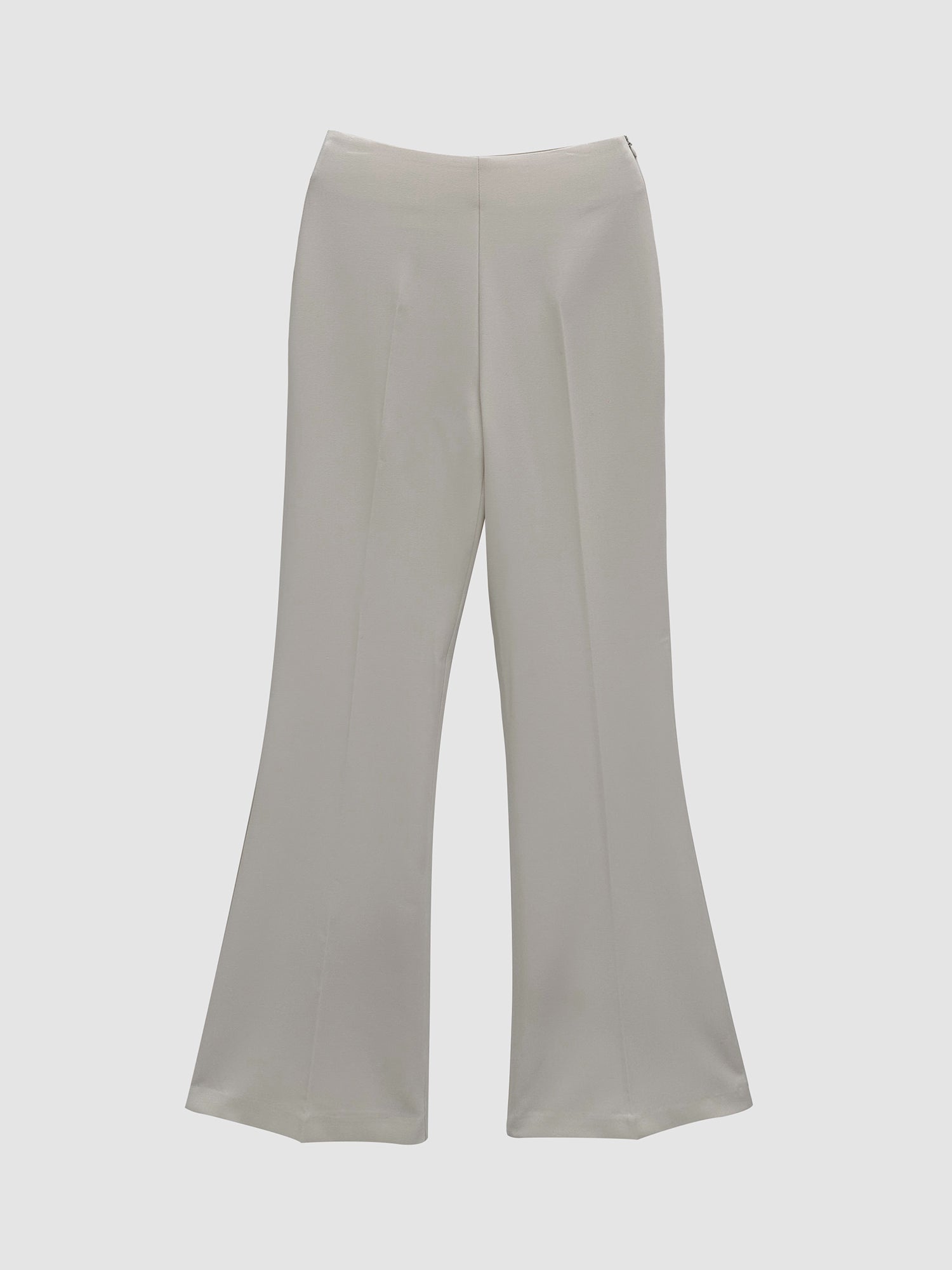 Front details of the ivory bootcut trouser showing the intricate detailed designs of the trouser.