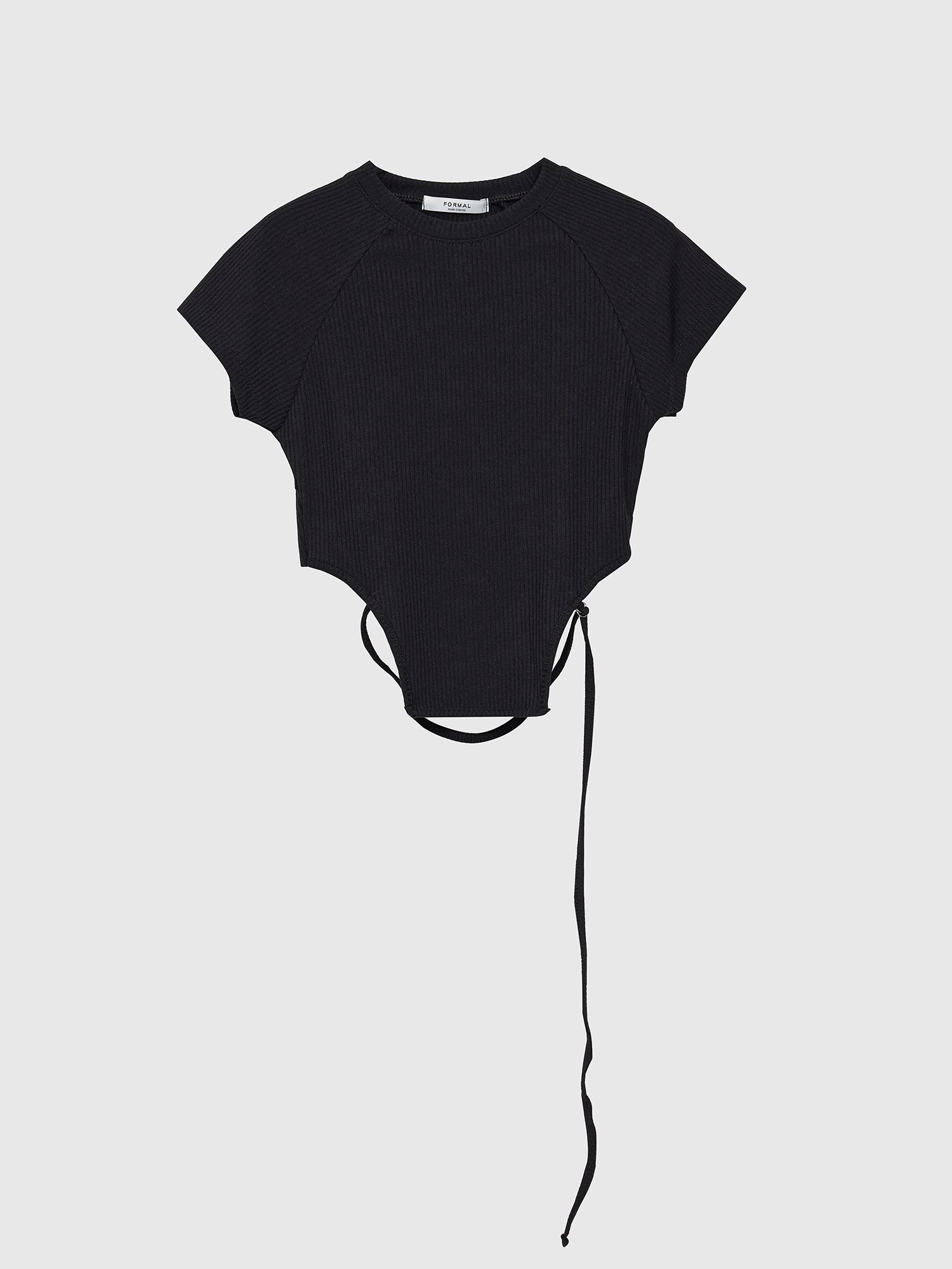 A front view of the black crop top with strap against a gray backdrop, highlighting its stylish appeal and suitability for Korean street fashion ensembles.