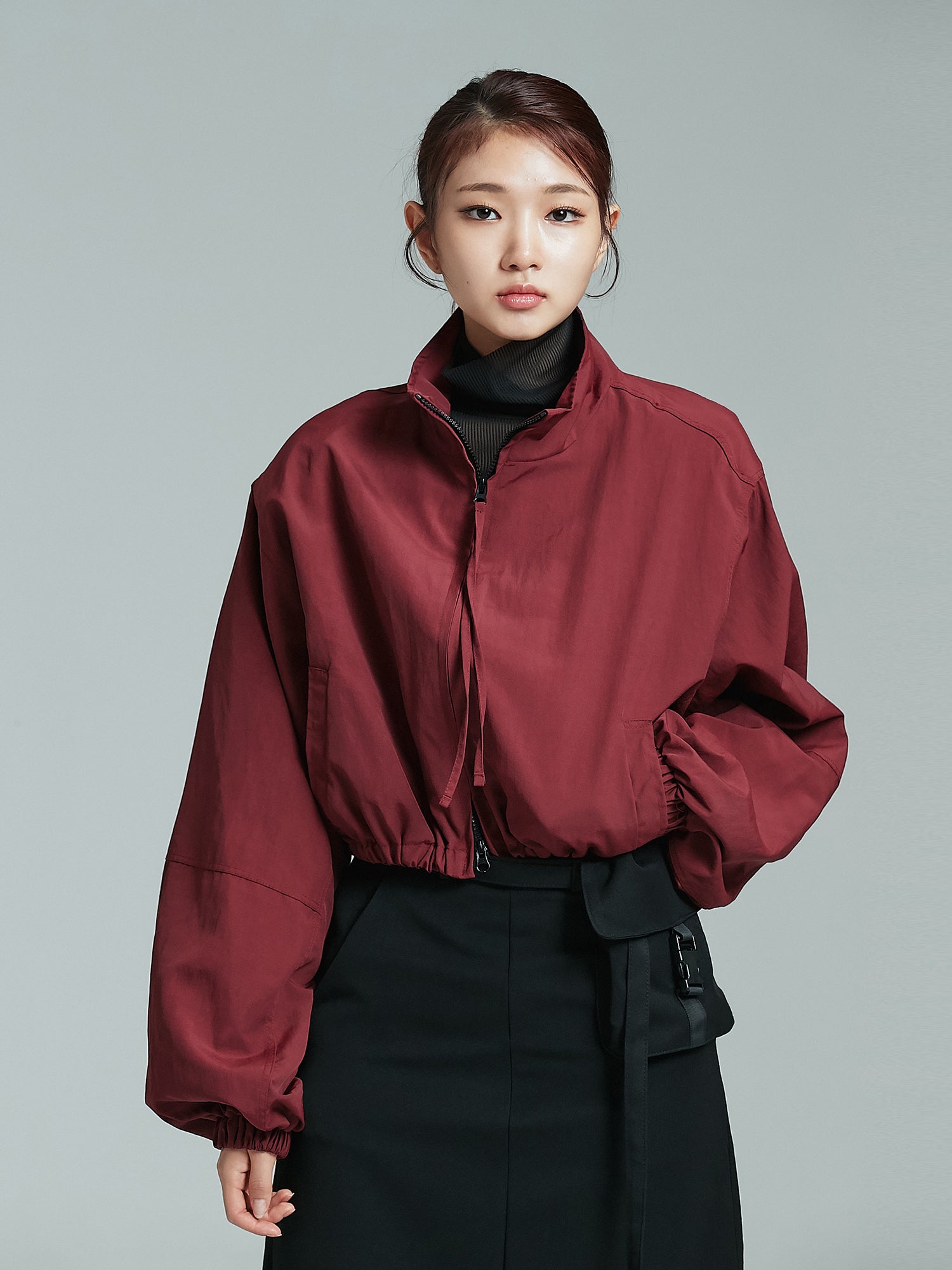 Front view of the cropped bomber jacket showcasing the korean street fashion look.