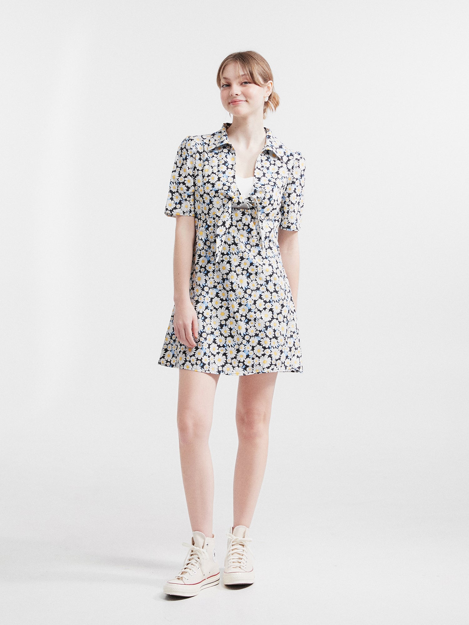 A K-pop-inspired model showcasing the Daisy Mini Dress with a stylish K-pop outfit flair.