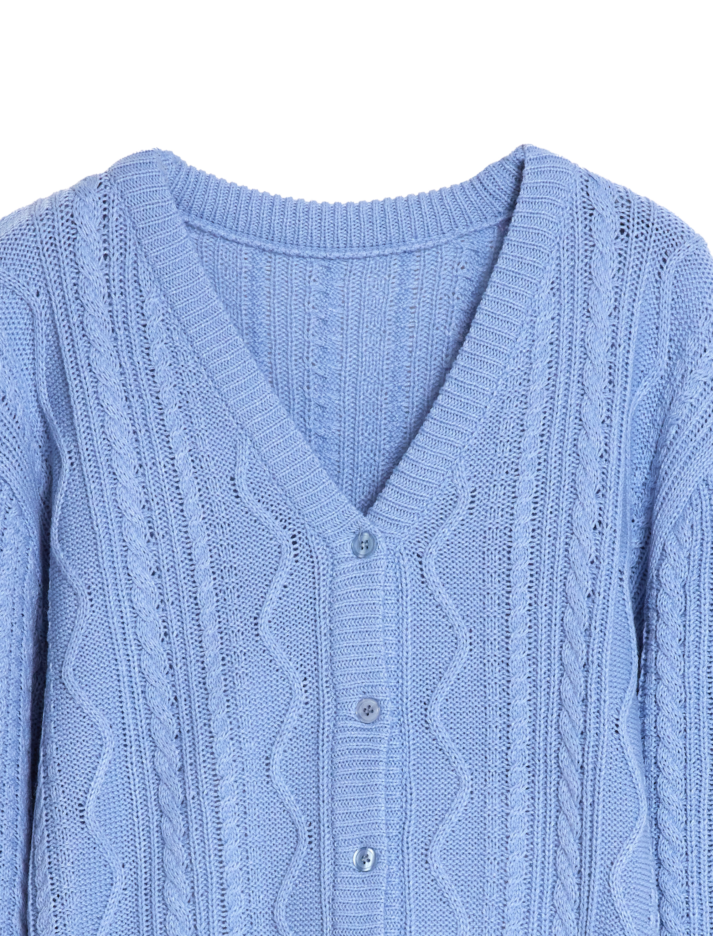 A close-up shot of the blue sweater highlighting the intricate v-neck and button front designs.