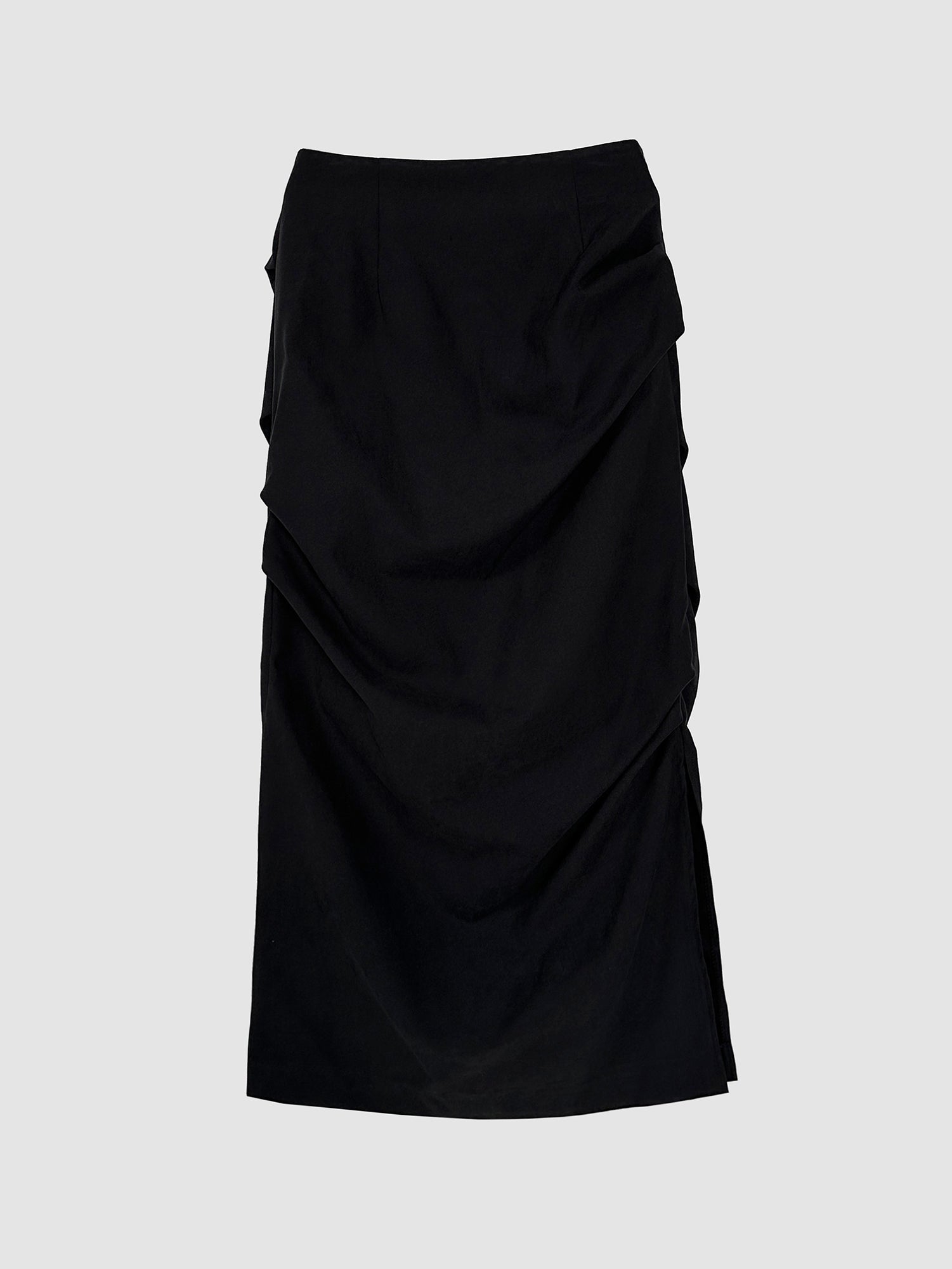 Frontal detailed view of the black fall draped skirt against a gray backdrop, embodying the chic allure of Korean street fashion.