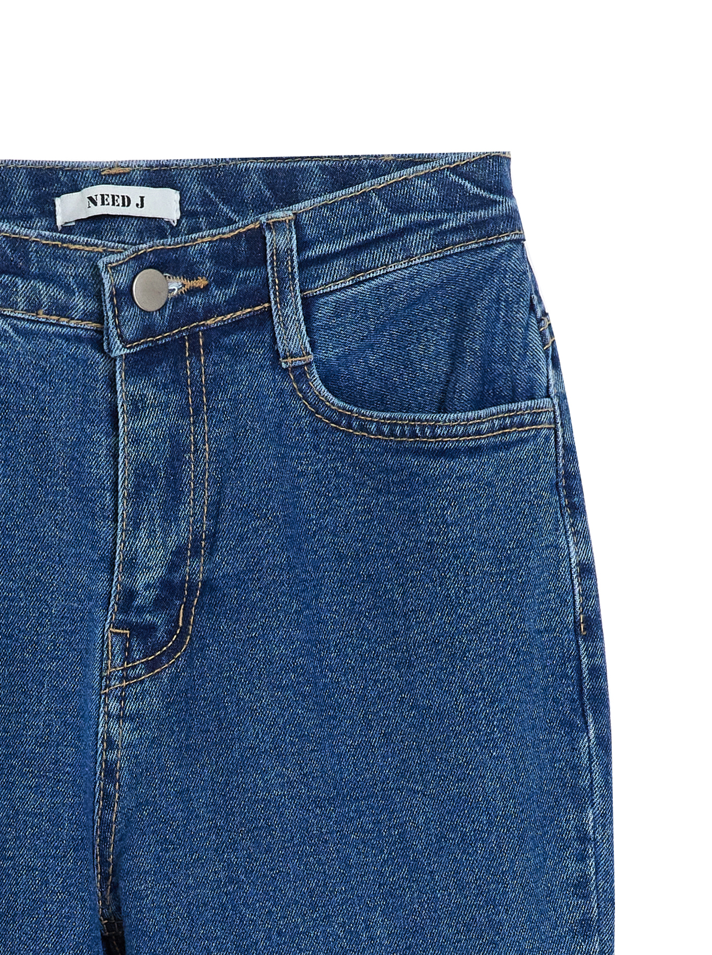 This is the zoomed-in shot, showcasing the precise stitching and texture of the denim fabric. 