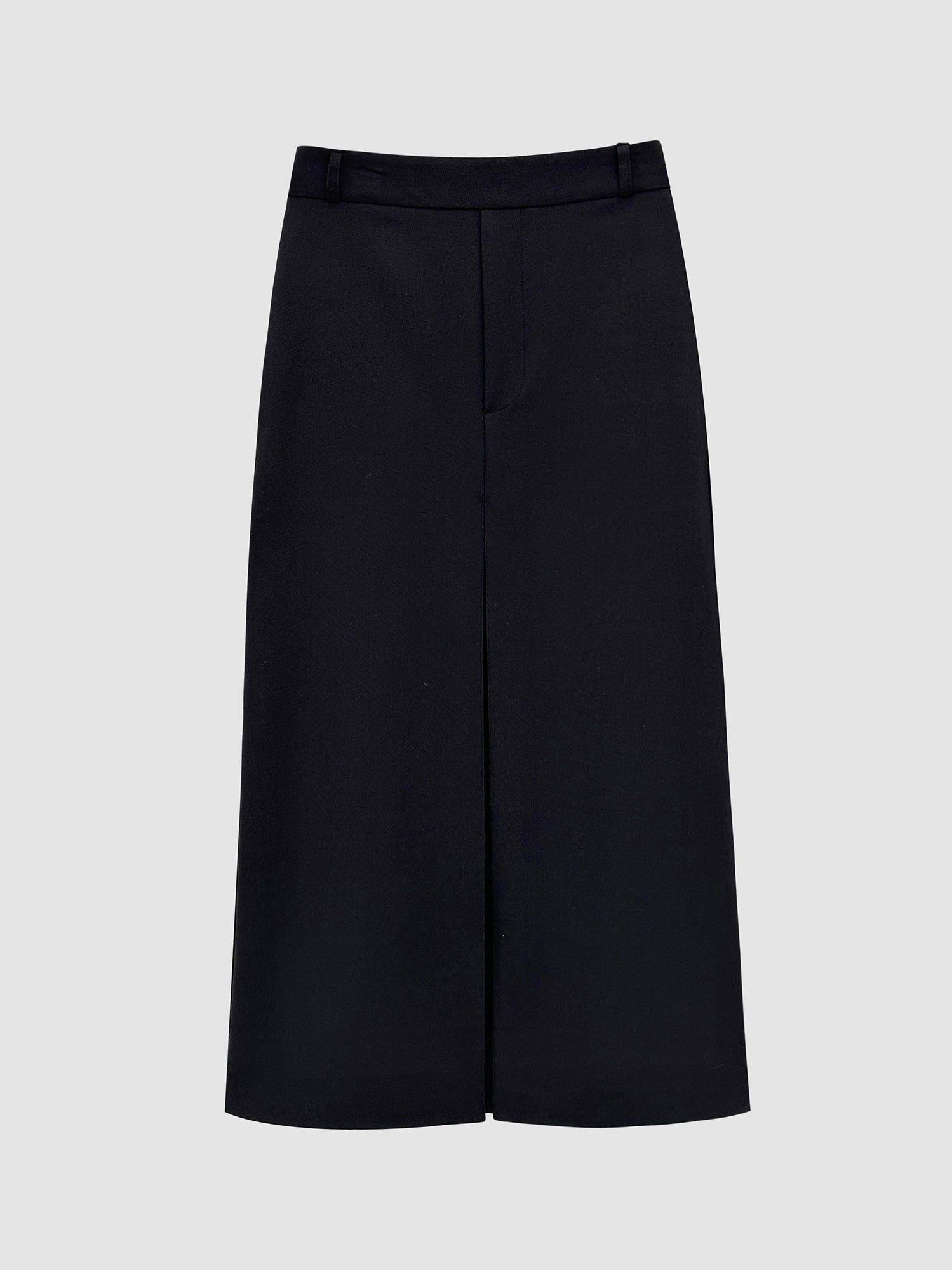 Product detailed view of the black front pleated maxi skirt with gray backdrop to accentuate its front detailed design.