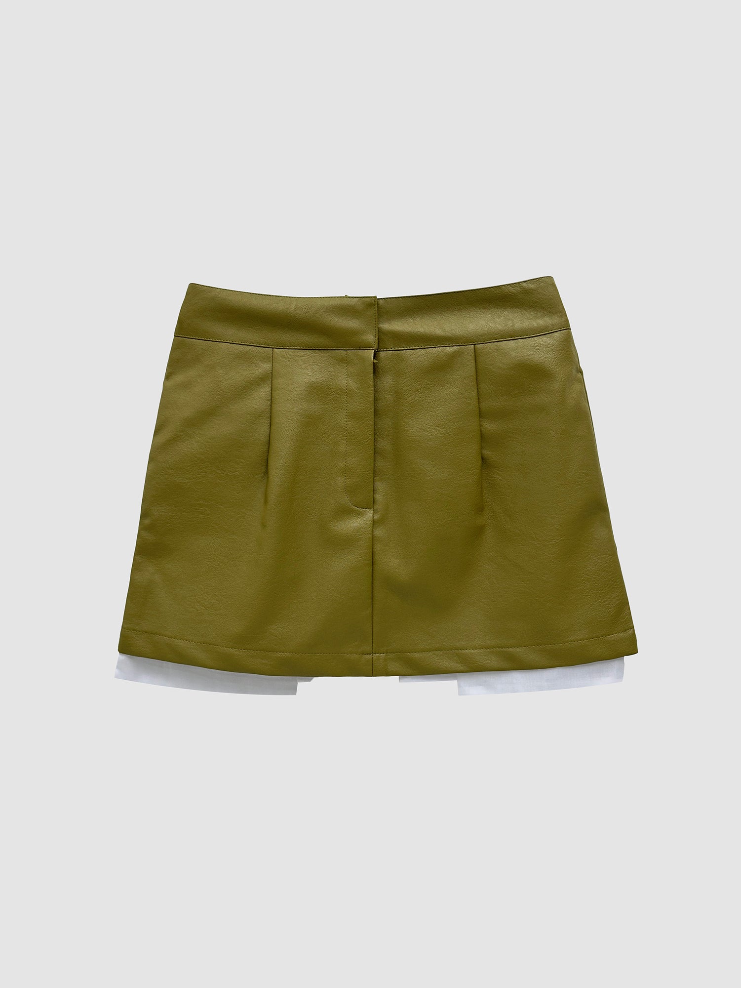 Product detailed view of the sage mini leather skirt showcasing its front detailed designs of the skirt.