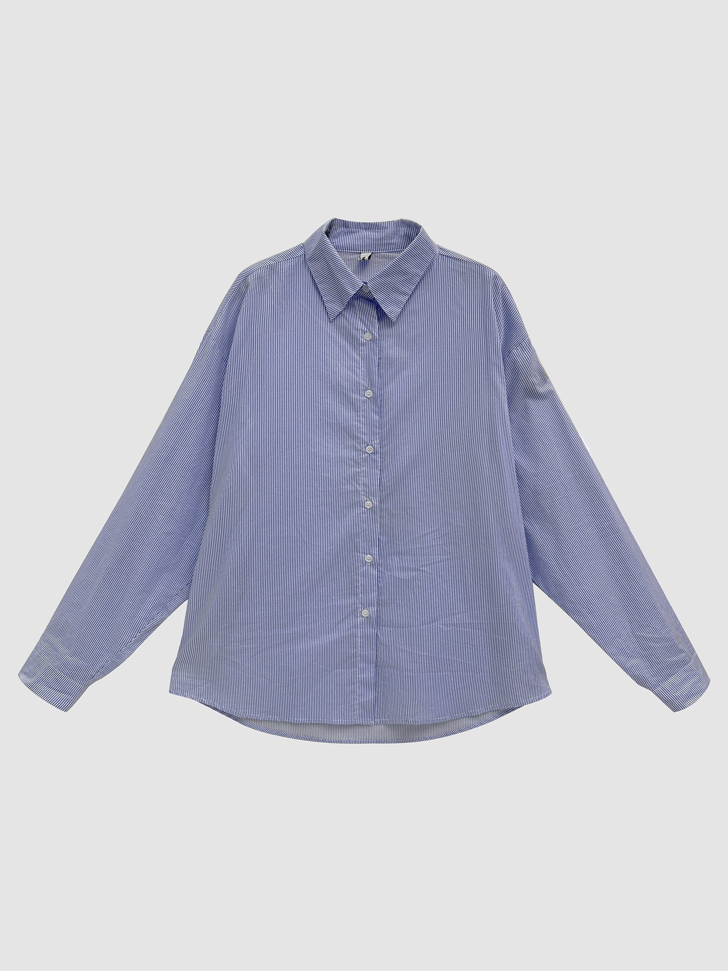 Product detailed view of the light blue oversized shirt showing its korean street style fashion.