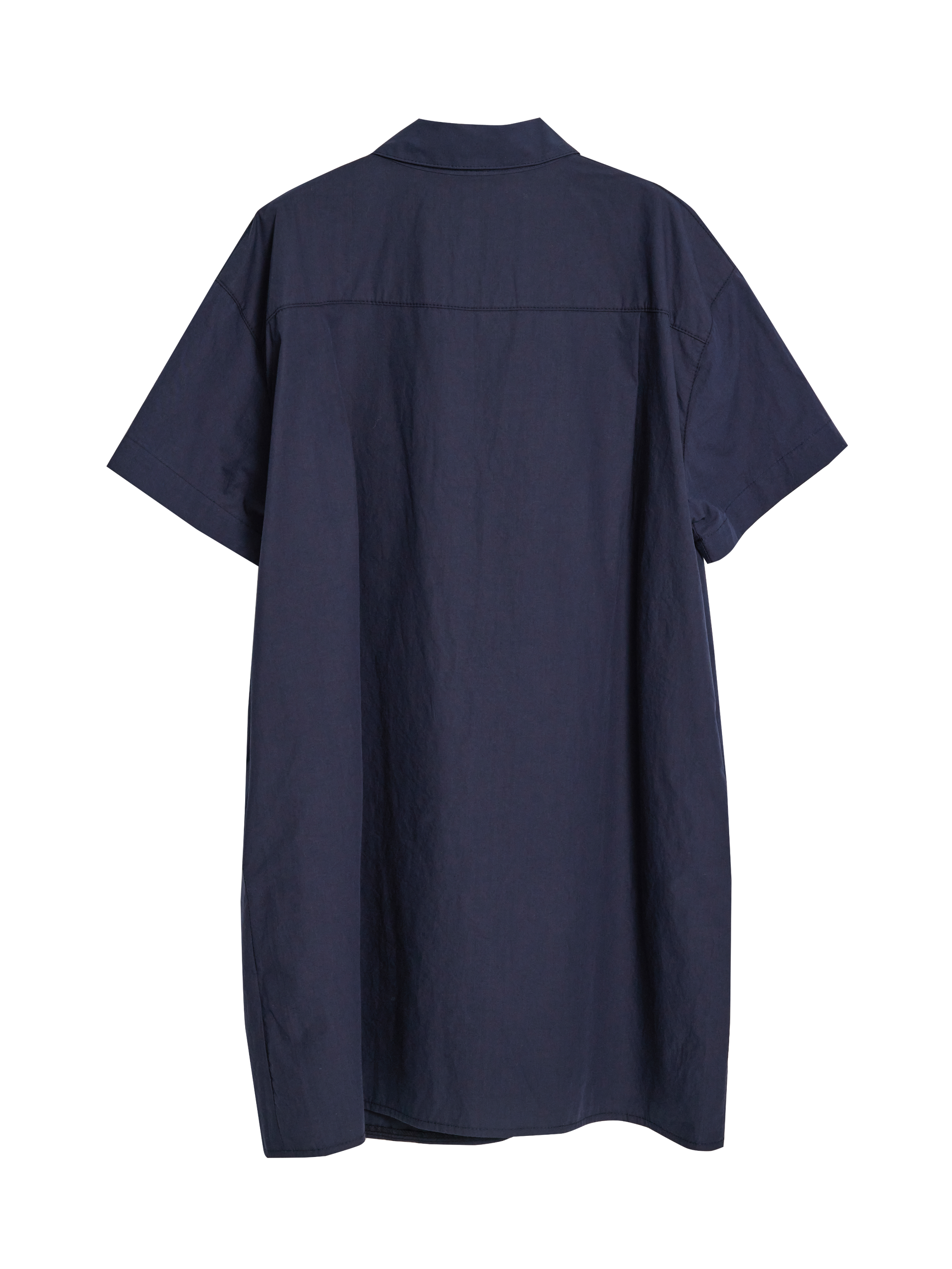 Back side of the navy shirt dress showing the details of the garment fit.