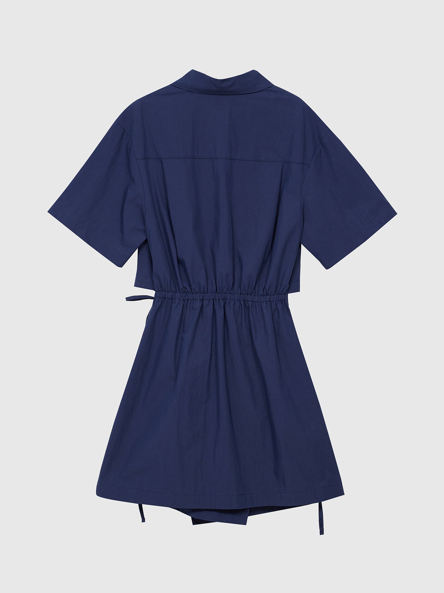 The back detail of our navy shirt dress, showcasing its uniquely sophisticated design.