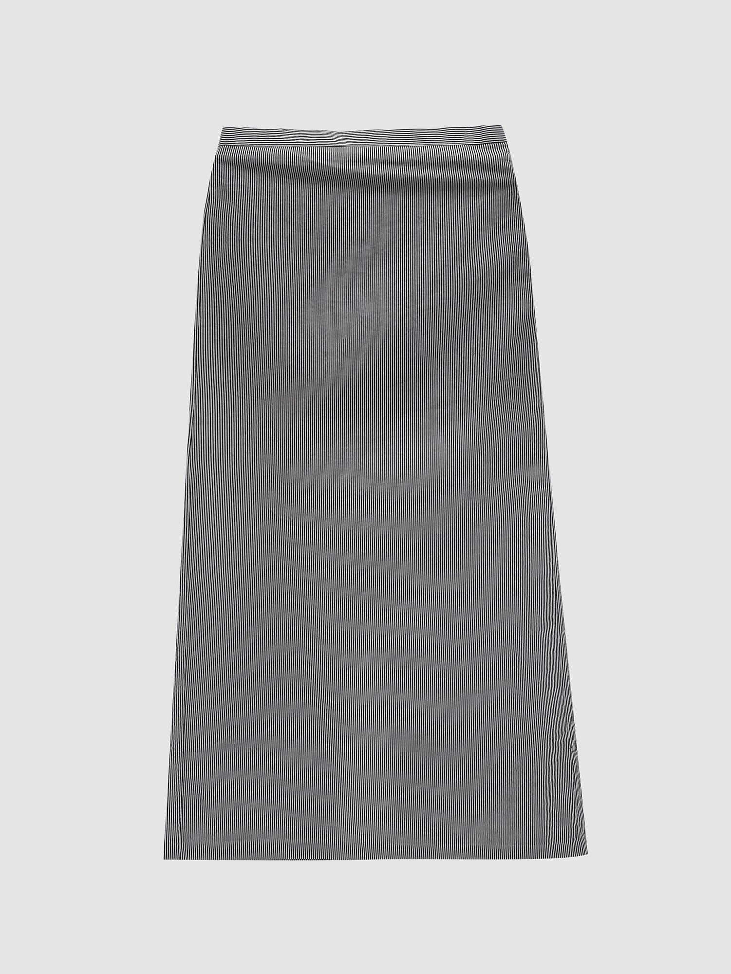 Front detailed view of the gray slit maxi skirt with gray backdrop.