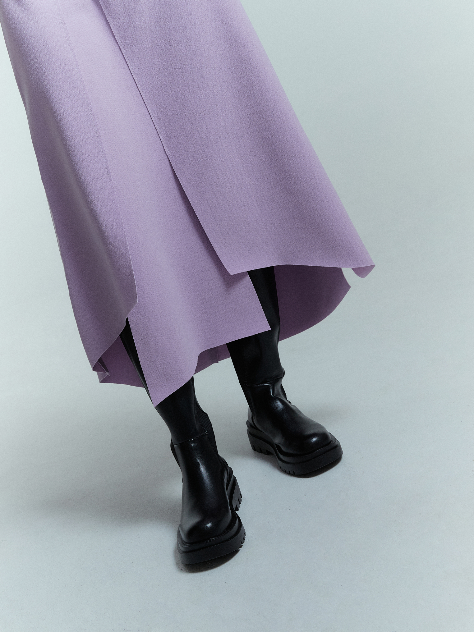 A zoomed-in shot of the tulip wrap skirt showcasing the bottom design of the skirt.