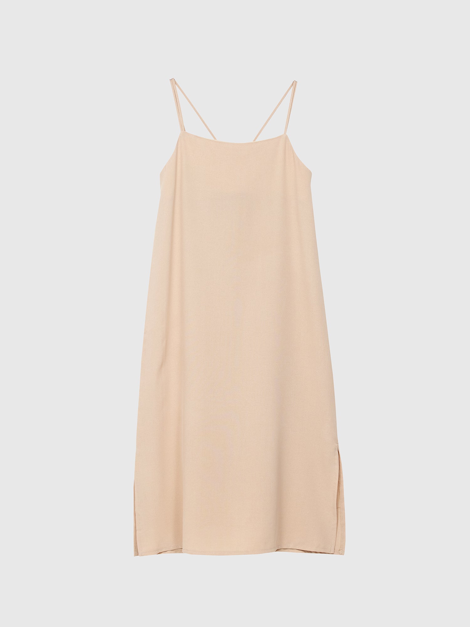 Product detailed view of the light beige cami dress showing its front design of the dress.