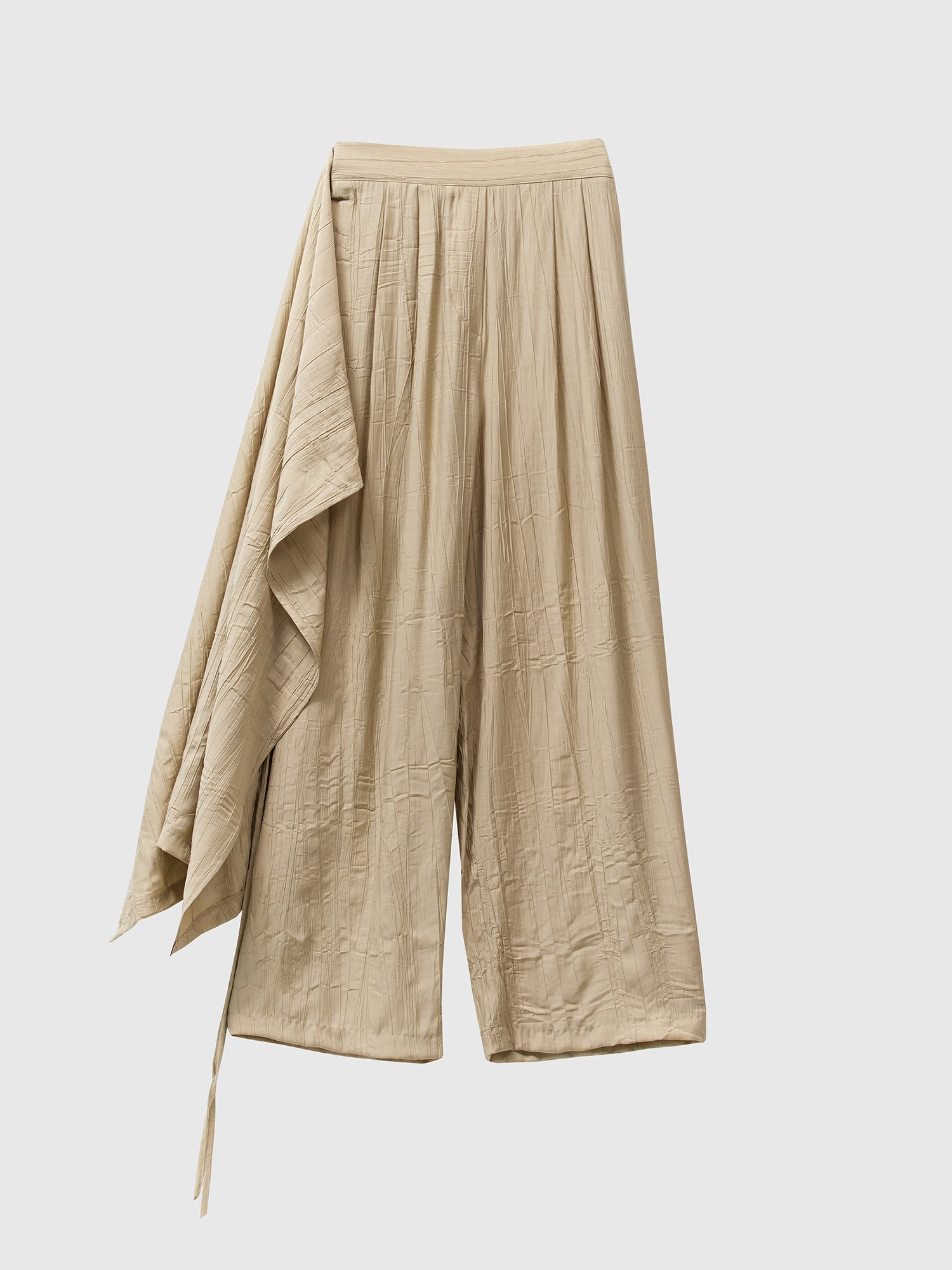 A detailed shot of the layered skirted pants showing the detailed design of the layered skirted pants.