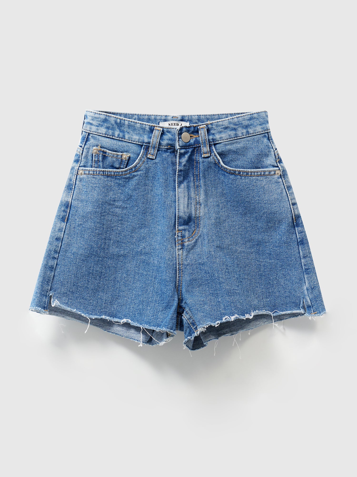 Product detailed shot of the jean shorts with white backdrop.