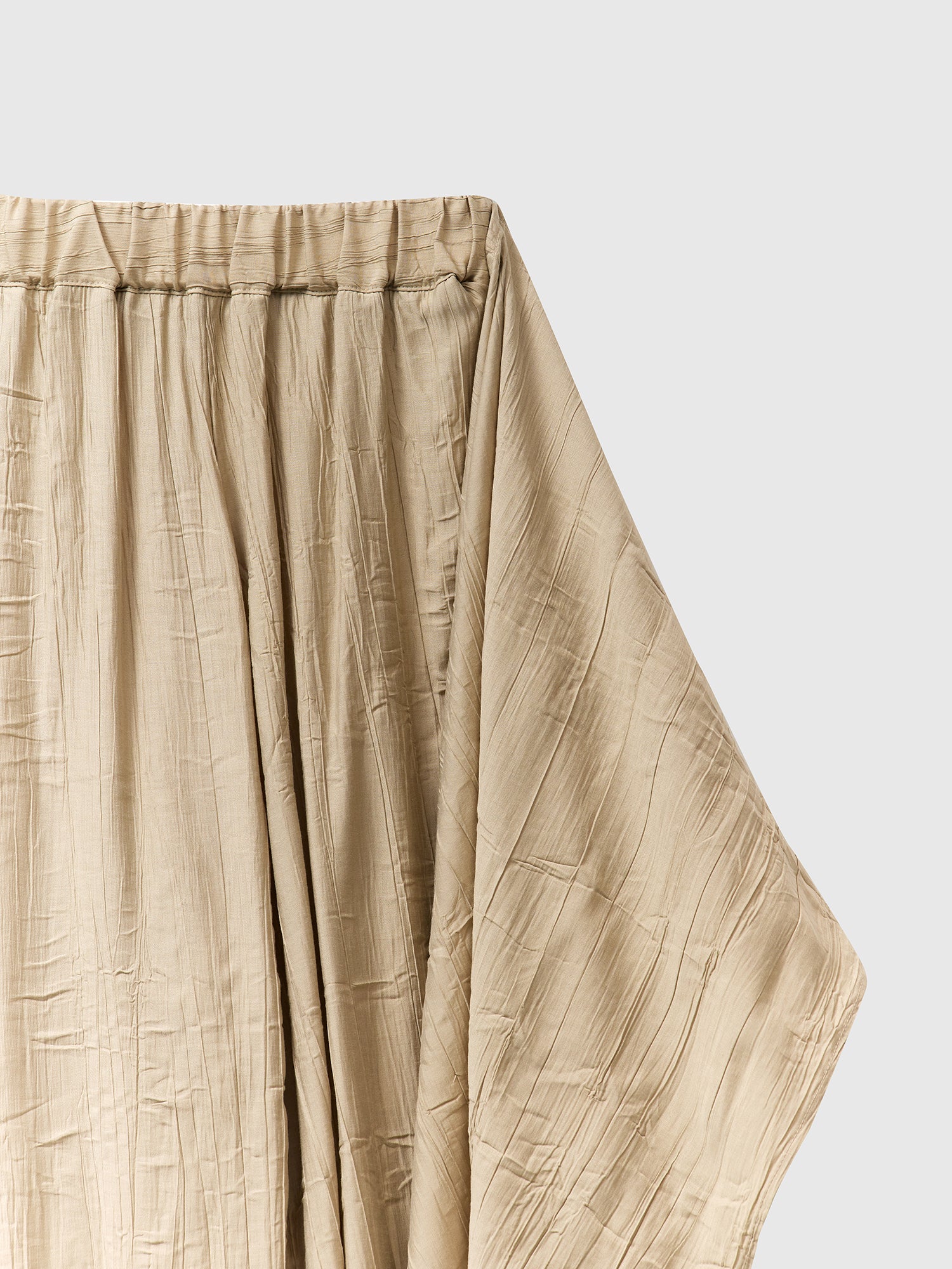 Product detailed view of the layered skirted pants showing the elasticated detailed of the pants.