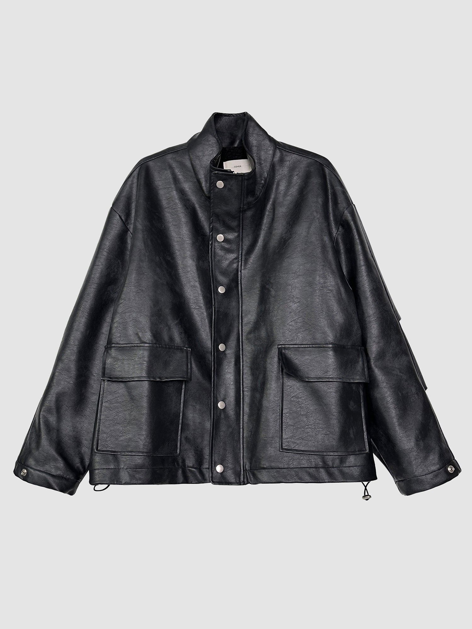 Frontal detailed view of the black-lined leather jacket, spotlighting its intricate leather details and embracing the edgy elegance of Korean street fashion.