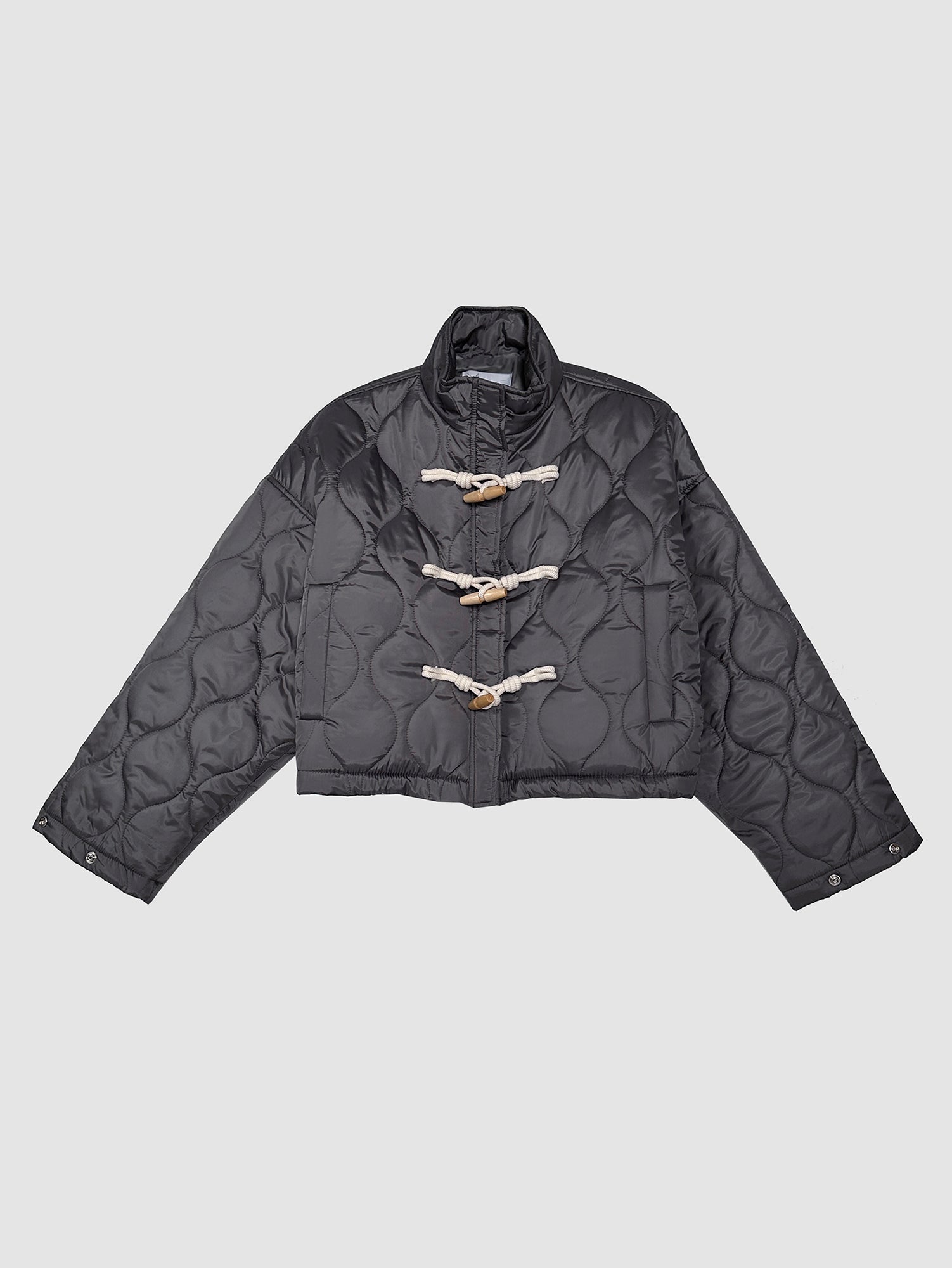 Frontal view of the Jaguar Quilted Jacket, epitomizing the chic allure of Korean street fashion.