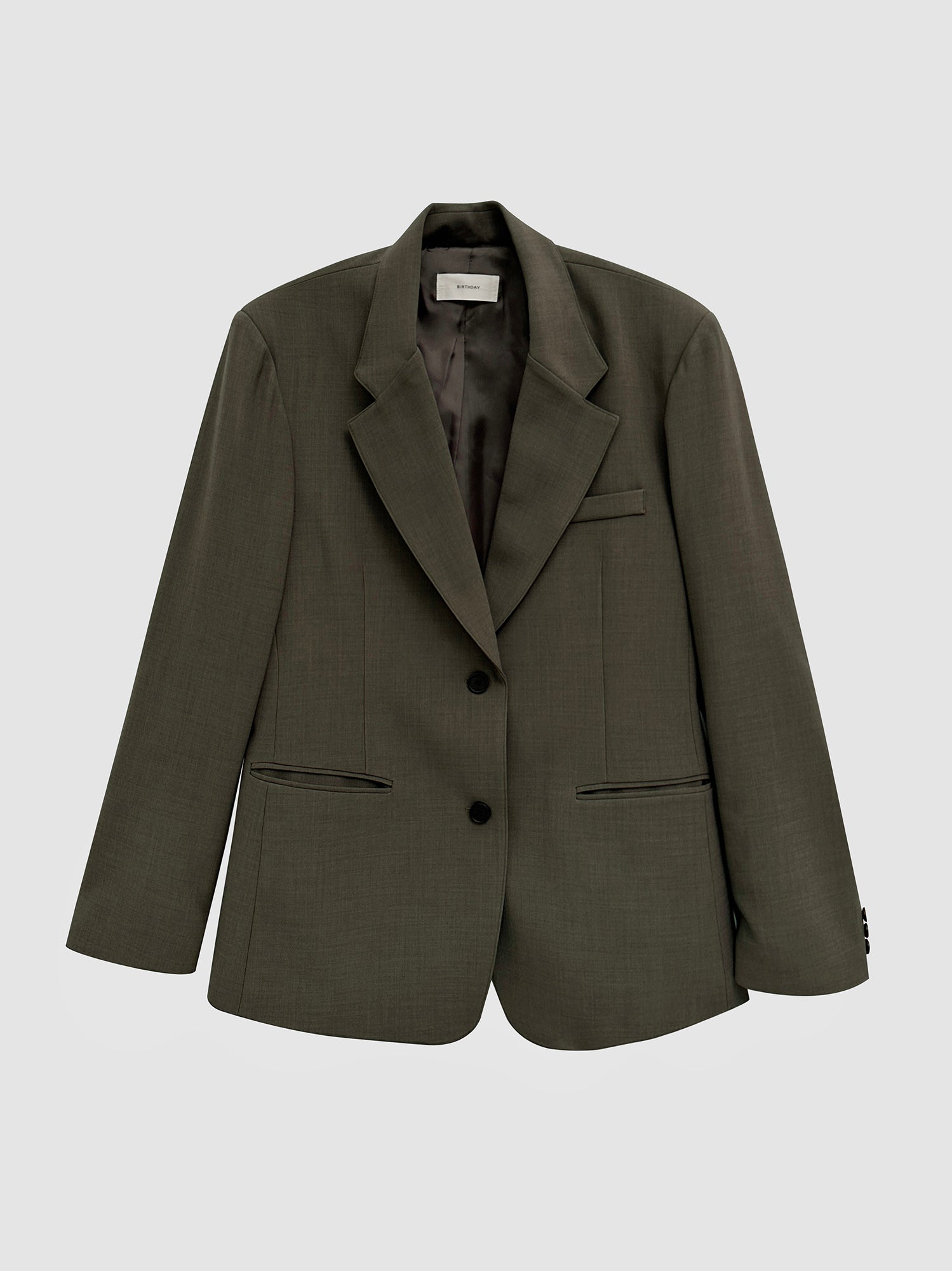 Product detailed view of the tate olive color of the oversized blazer showing the front detailed design of the blazer.