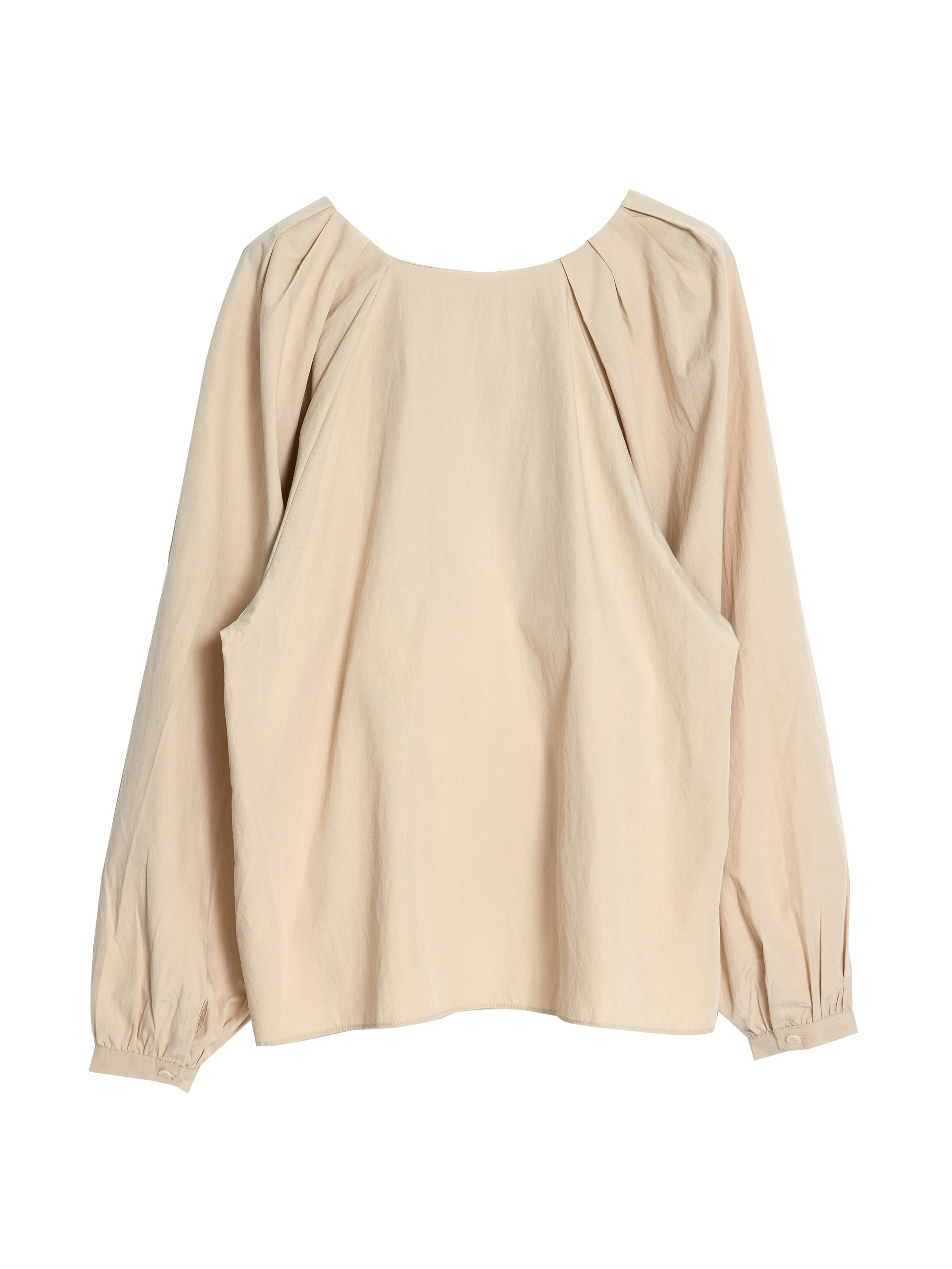 A product detailed shot of the raglan sleeve blouse showcasing the back side of the blouse.