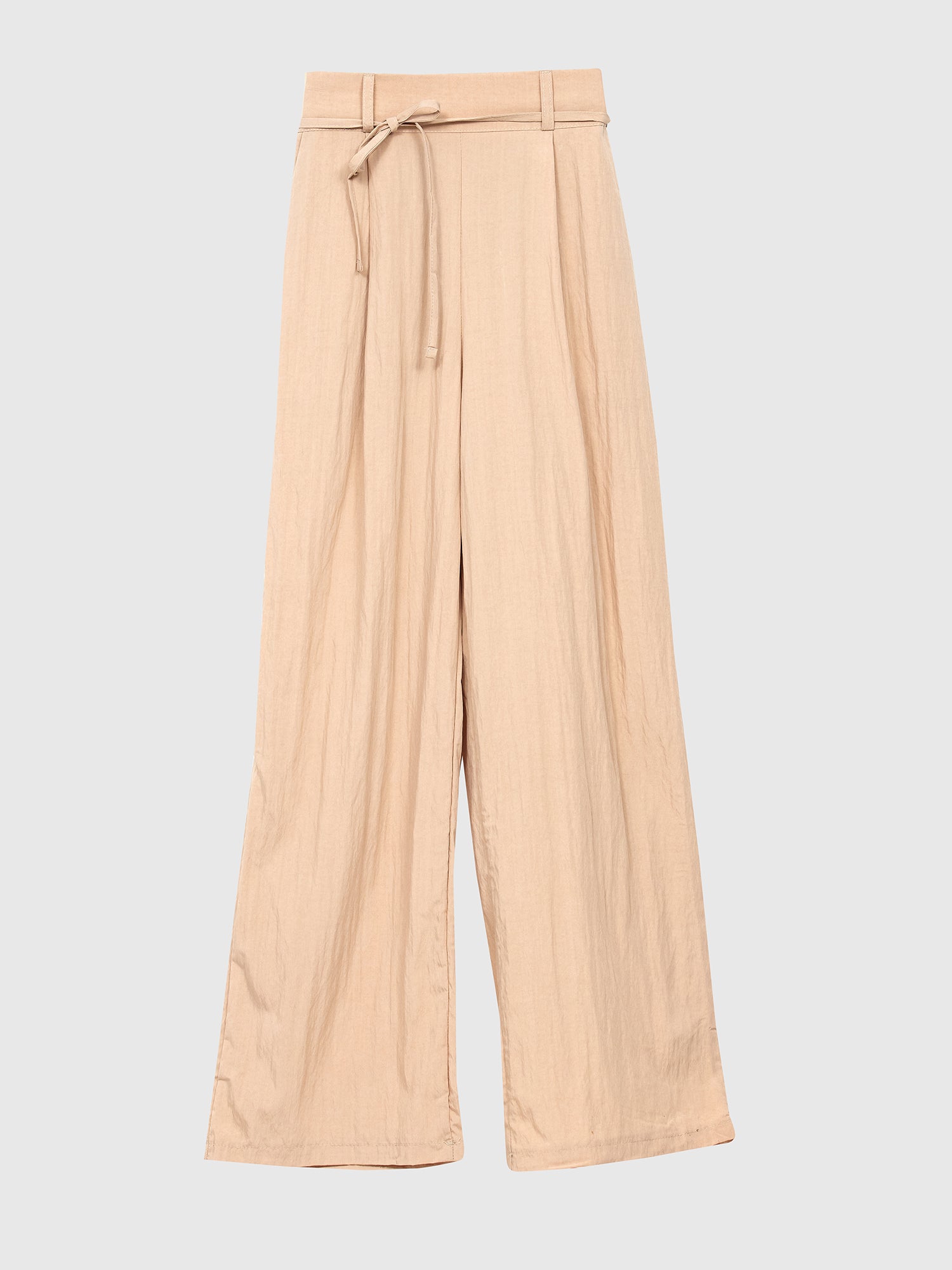 A front view of the beige tie belt pants, highlighting the intricate front design details and embracing contemporary fashion.